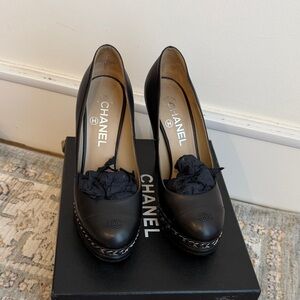 CHANEL Black Leather Heels with Chain Detail